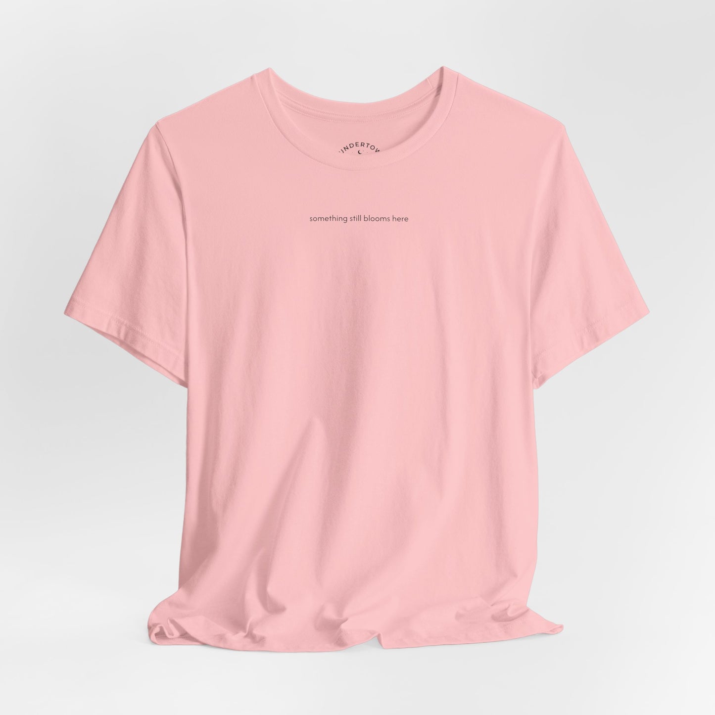 something still blooms here - whale skeleton and coral graphic t-shirt