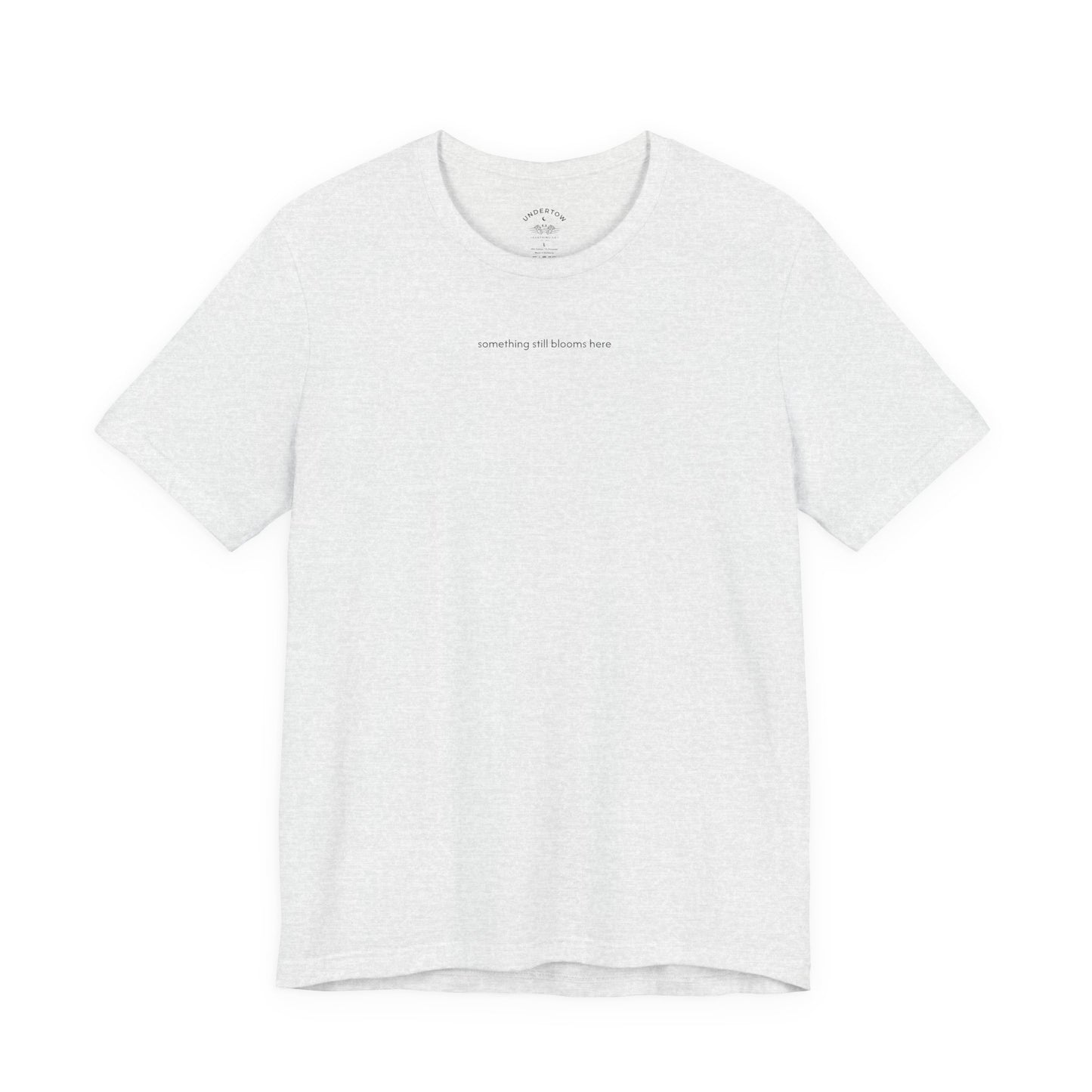 something still blooms here - whale skeleton and coral graphic t-shirt