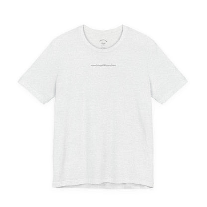 something still blooms here - whale skeleton and coral graphic t-shirt