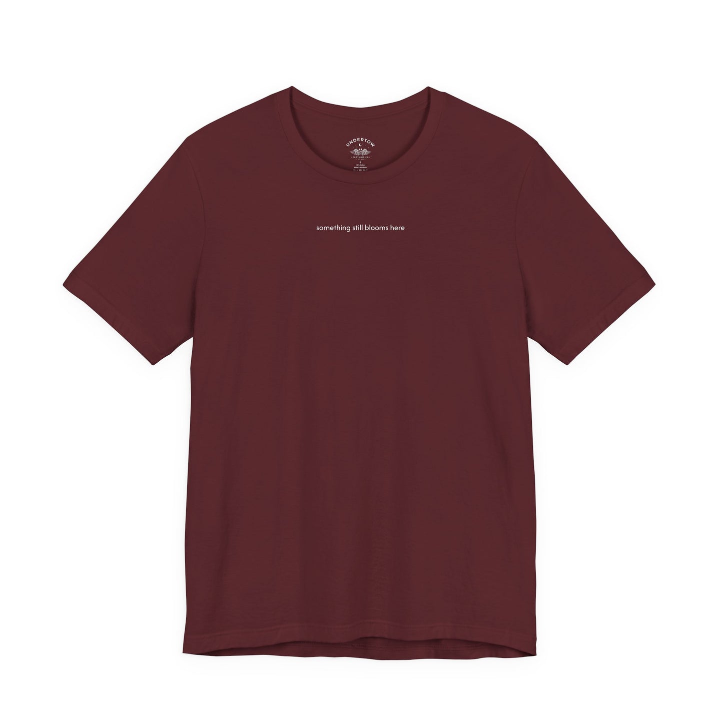 something still blooms here - whale skeleton and coral graphic t-shirt
