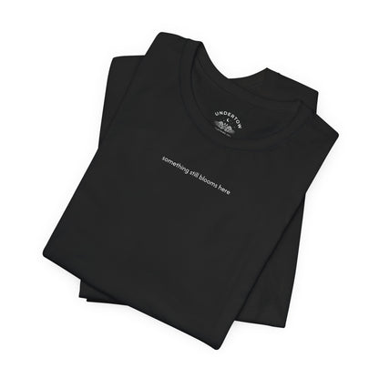 something still blooms here - whale skeleton and coral graphic t-shirt