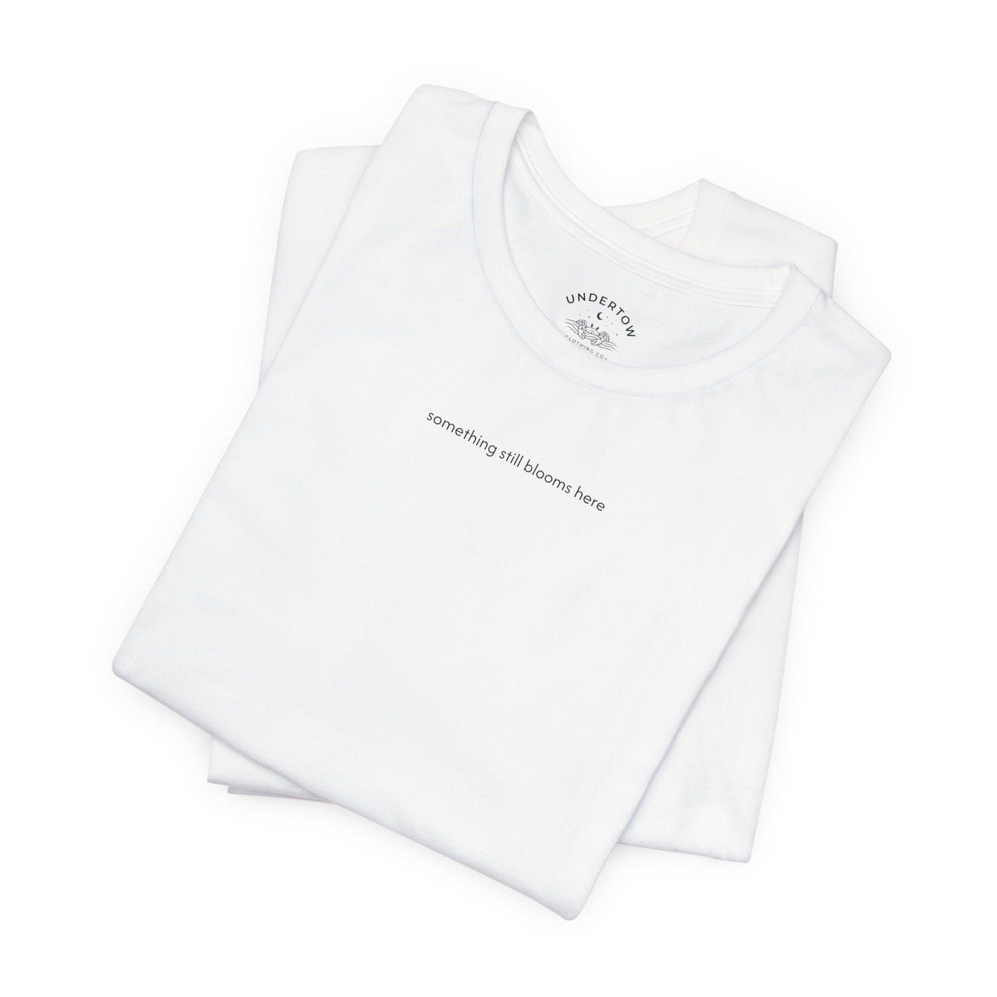 something still blooms here - whale skeleton and coral graphic t-shirt
