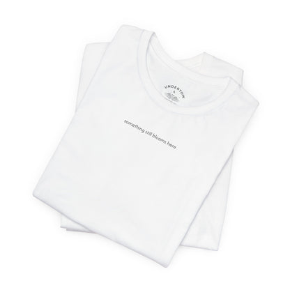 something still blooms here - whale skeleton and coral graphic t-shirt