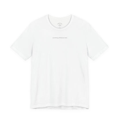 something still blooms here - whale skeleton and coral graphic t-shirt