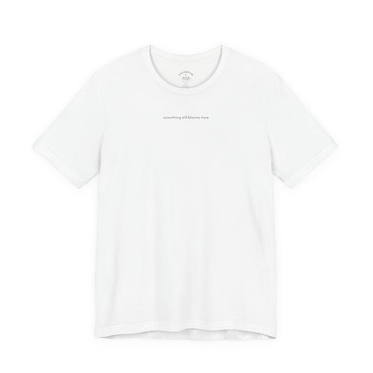 something still blooms here - whale skeleton and coral graphic t-shirt