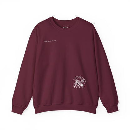 fragile, but functional - crewneck sweater with hermit crab