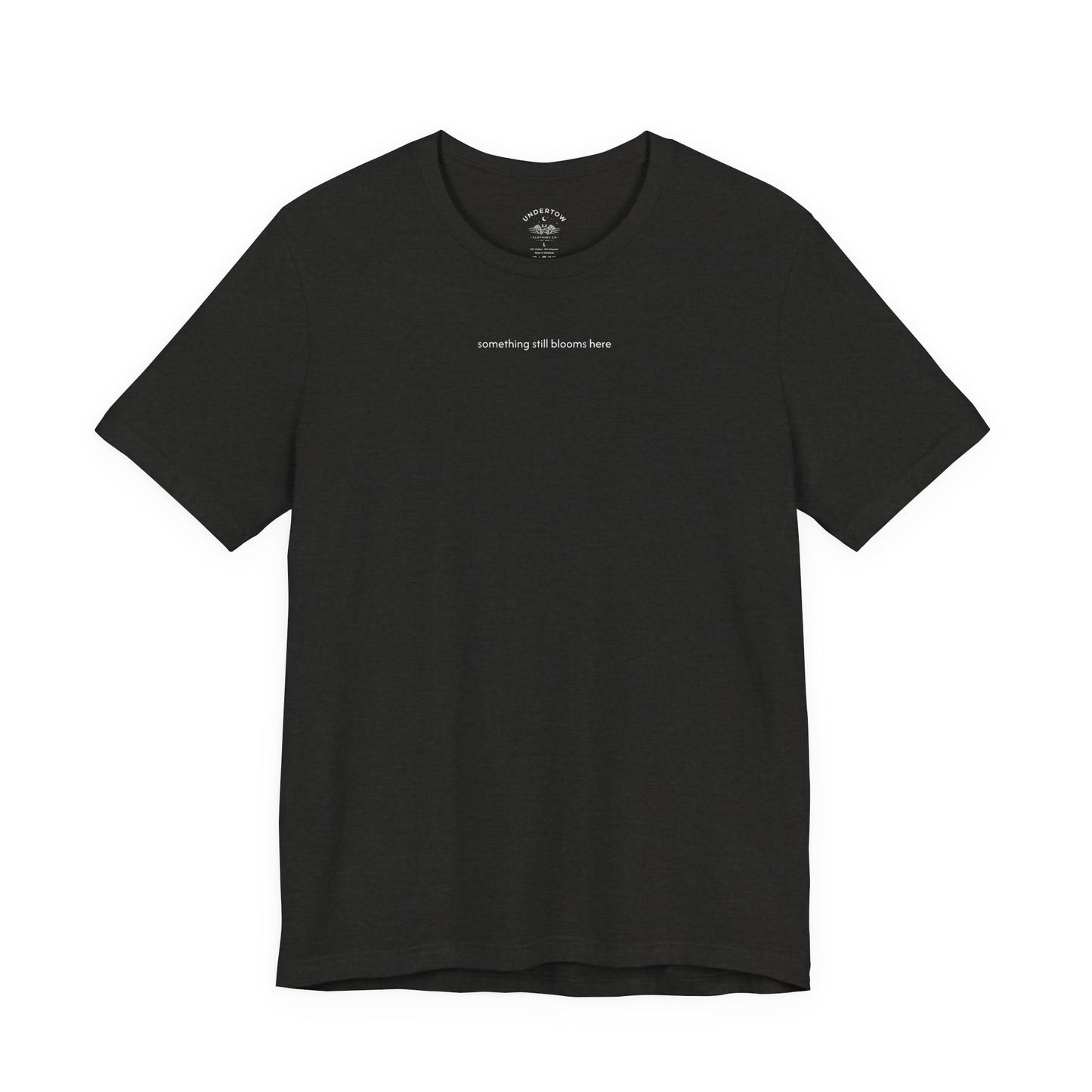 something still blooms here - whale skeleton and coral graphic t-shirt