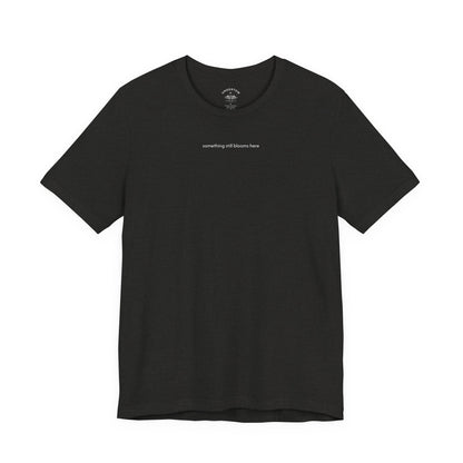 something still blooms here - whale skeleton and coral graphic t-shirt