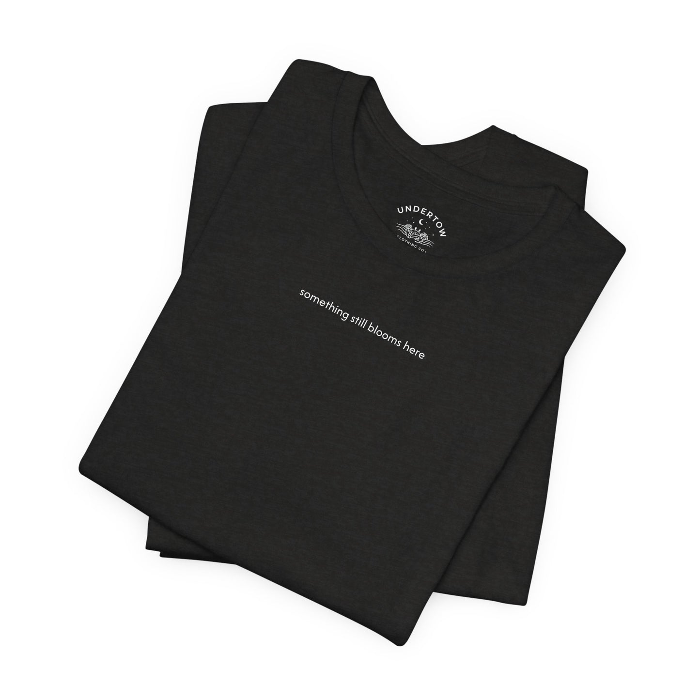something still blooms here - whale skeleton and coral graphic t-shirt