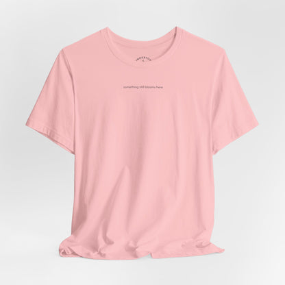 something still blooms here - whale skeleton and coral graphic t-shirt