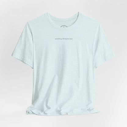 something still blooms here - whale skeleton and coral graphic t-shirt