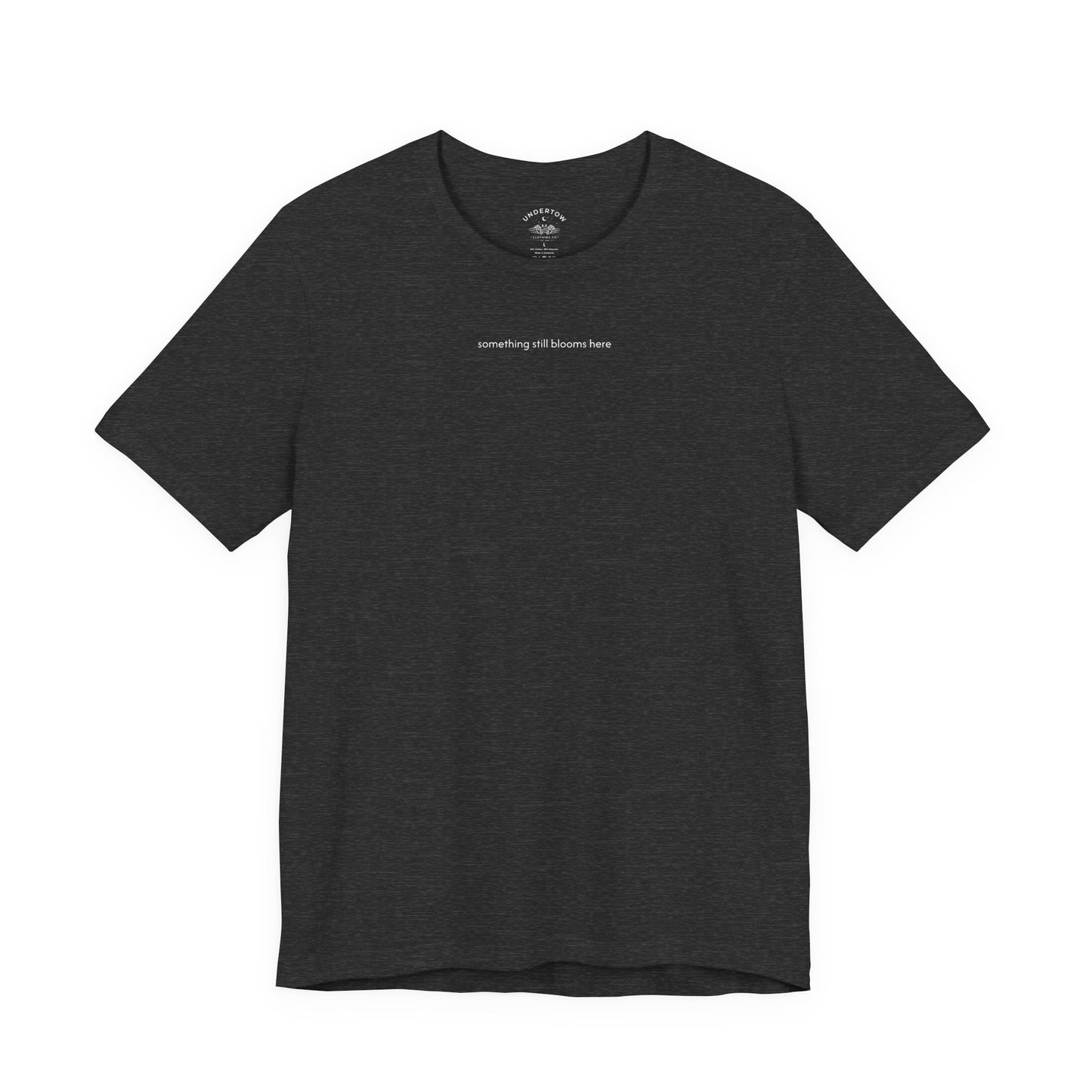 something still blooms here - whale skeleton and coral graphic t-shirt