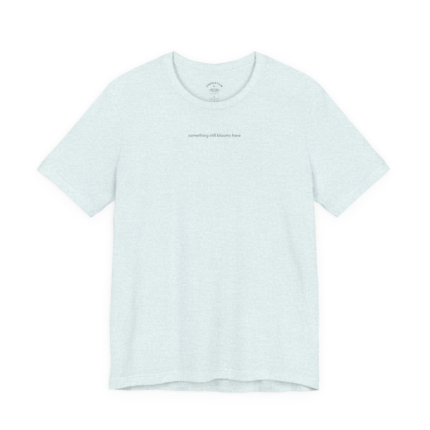 something still blooms here - whale skeleton and coral graphic t-shirt