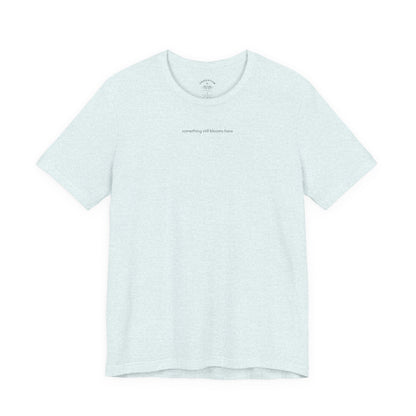 something still blooms here - whale skeleton and coral graphic t-shirt