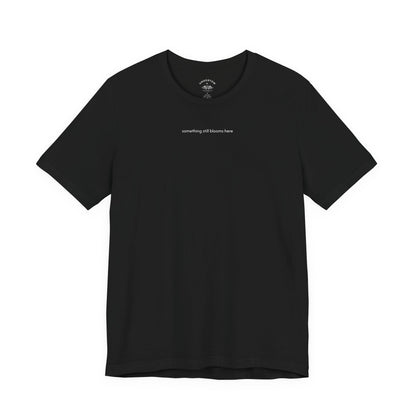 something still blooms here - whale skeleton and coral graphic t-shirt