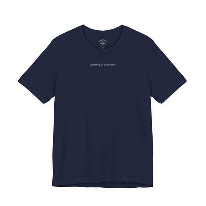 something still blooms here - whale skeleton and coral graphic t-shirt