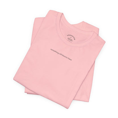 something still blooms here - whale skeleton and coral graphic t-shirt