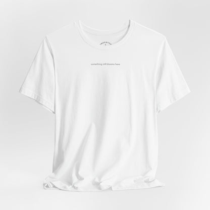 something still blooms here - whale skeleton and coral graphic t-shirt