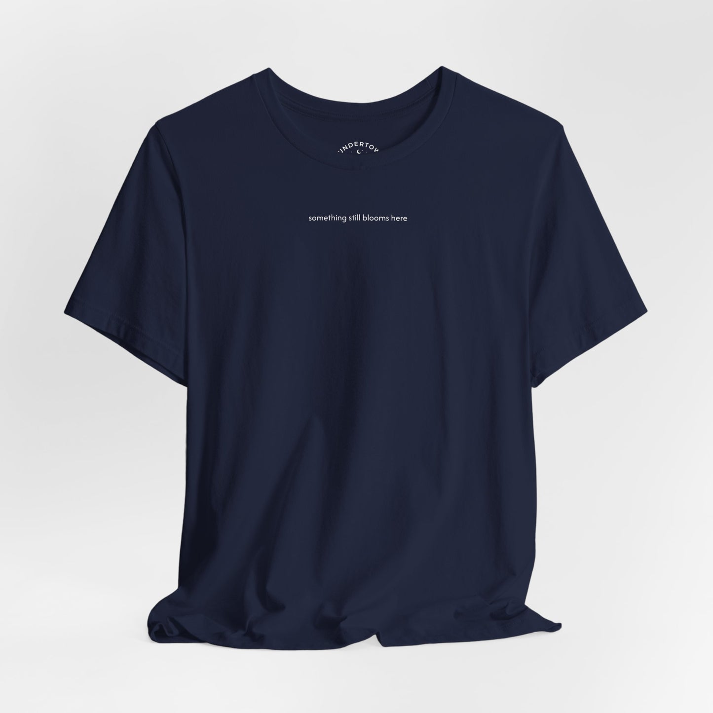 something still blooms here - whale skeleton and coral graphic t-shirt