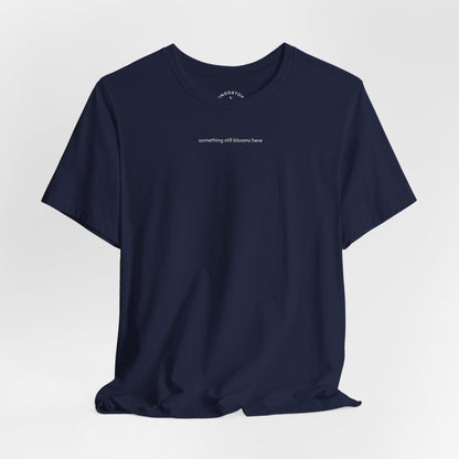 something still blooms here - whale skeleton and coral graphic t-shirt