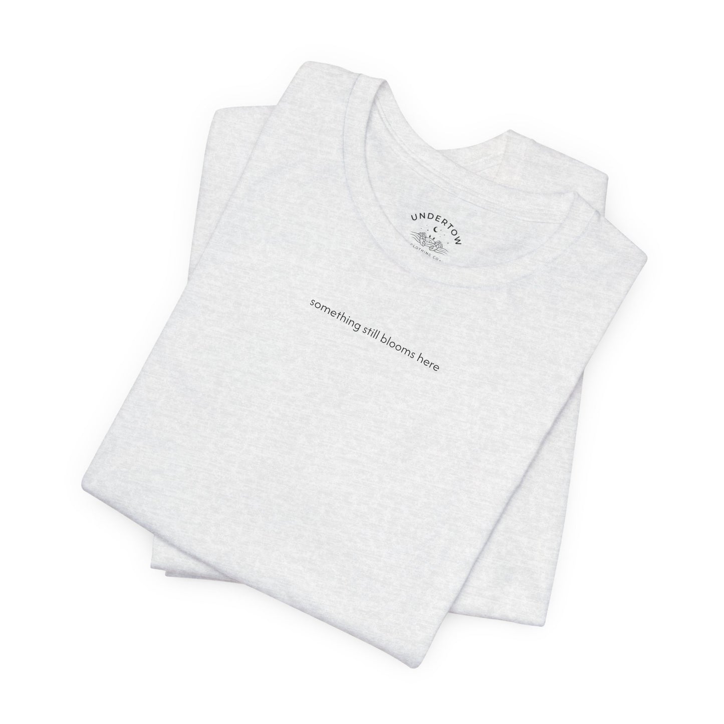something still blooms here - whale skeleton and coral graphic t-shirt
