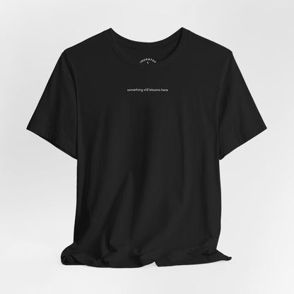 something still blooms here - whale skeleton and coral graphic t-shirt